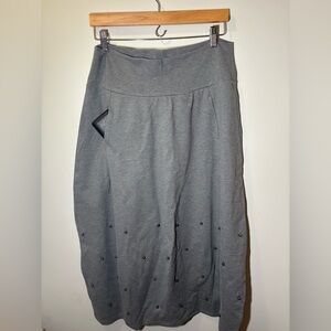 Bell shaped skirt with baubles